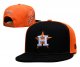 Houston Astros's black and orange cap